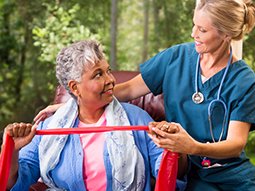 Senior adult patient undergoing rehabilitiation care from the specialist